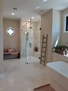 Freshly painted modern bathroom with neutral walls and walk-in glass shower in Scottsdale, AZ
